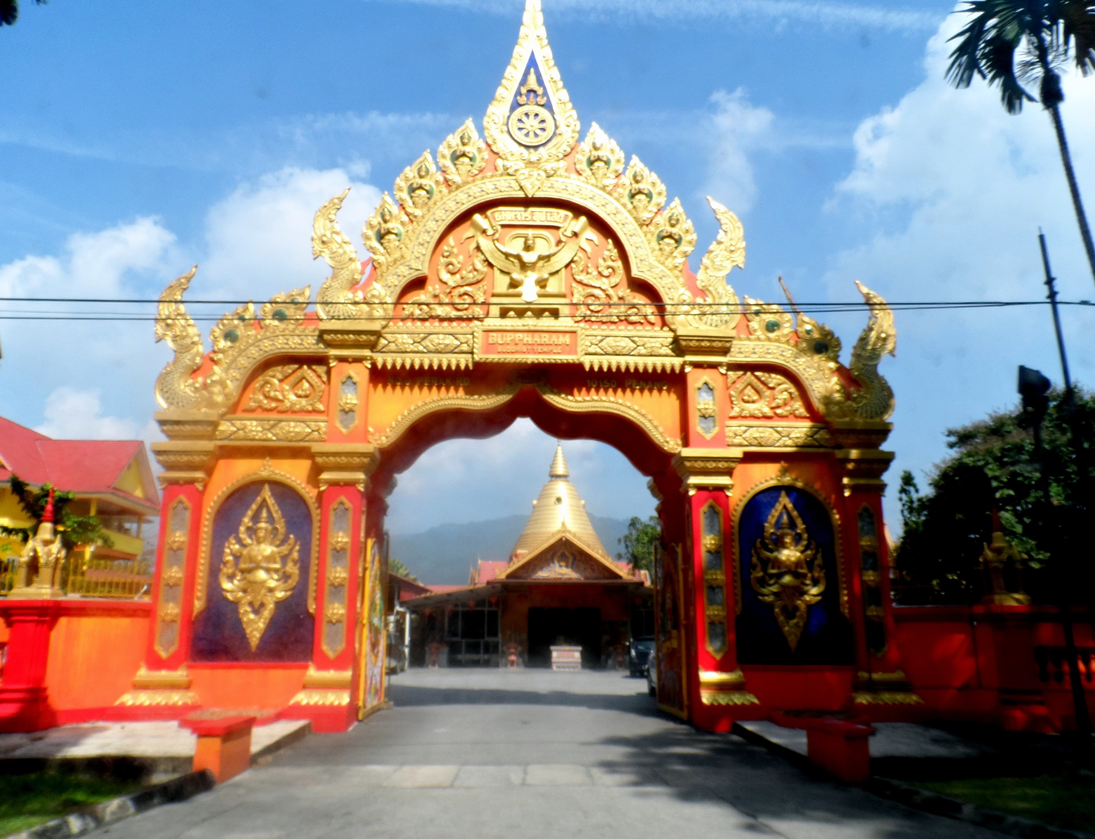 Main entrance arch of Wat Buppharam, Pulau Tikus, George Town, Penang, with temple name visible on the arch